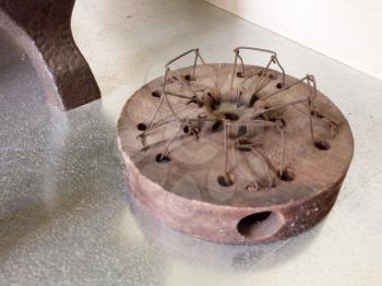 antique mouse trap brown round design with holes
