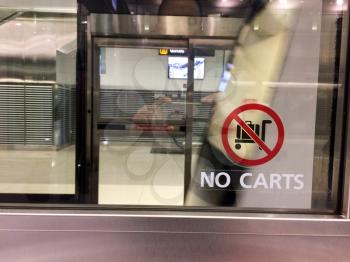 No carts sign on train from airport terminal