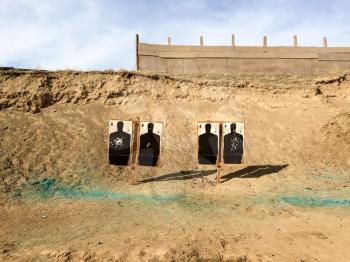 Shooting targets at gun range outdoor black silhouettes