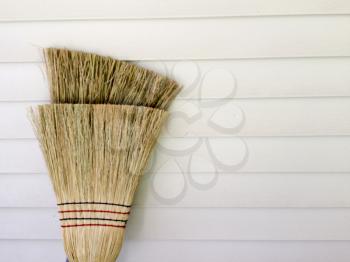 traditional broom background with white line of wall