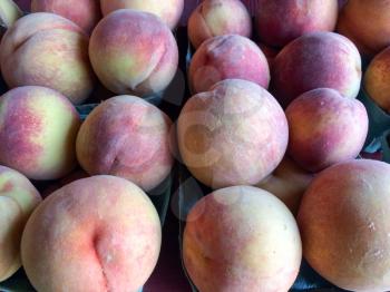 ripe peaches in basket for sale farmers marketplace