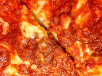 delicious red pizza slices close up on plate yummy to eat