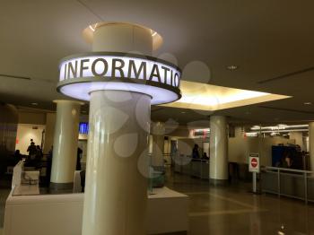 Information desk at airport travel terminal station counter