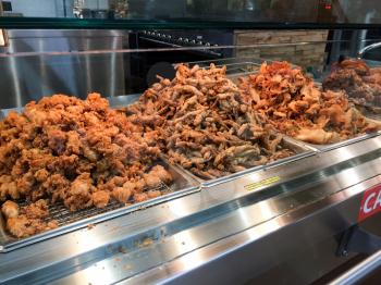 greasy fried foods in trays traditional meals of philippines pinoy