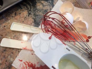 Messy baking utensils whisk spatula after making cupcakes