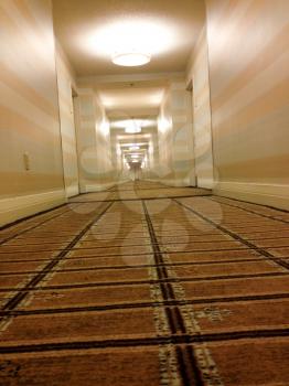 Hotel hallway long perspective corridor with carpet pattern background