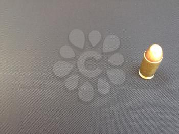 Bullets for handgun pistol firearm closeup on black backgound text space design element business card sign