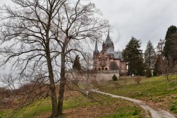 Konigswinter, Germany - 2 March 2019: Drachenburg castle on a gloomy day