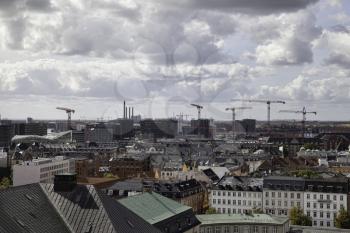 Copenhagen skyline with construction cranes working on new developments