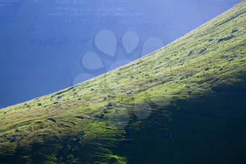 Blue mountain and green grass, Kalsoy, Faroe Island