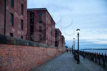 Liverpool, UK - 19 October 2019: Residential buildings in the area of Albert Dock at dusk