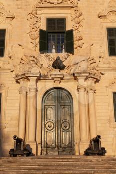 Valletta, Malta - 5 January 2020: Castille Palace entrance at sunset