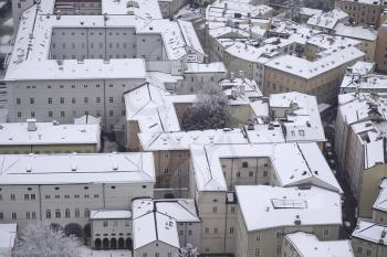Urban geometry of Salzburg rooftops covered with snow, close-up