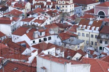 View over red tiled roofs of Baixa neighbourhood in Lisbon, Portugal.