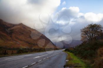 Road A87 going through the Scottish Highlands photographed in autumn