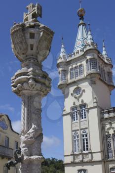 Sculpture outside Sintra Town Hall baroque building on a sunny day with blue sky.