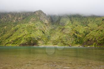 The fine, sedimentary beach of Lagoa do Fogo, with view of crater rim