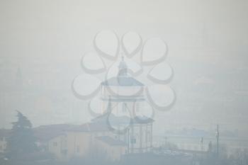 Santa Maria del monte dei cappuccini covered with fog