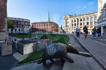 Riga, Latvia - 24 August 2019 - Armadillo statue, Labirints at Dome square