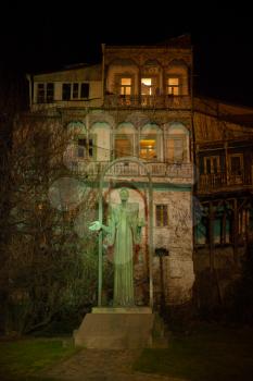 Tbilisi, Georgia - 23 March 2016: Statue of Yetim Gurdji in Old Tbilisi at night
