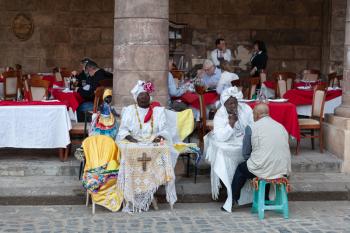 Havana, Cuba - 1 February 2015: Cuban santeria practitioners on Plaza de la Catedral