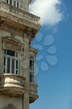 Havana, Cuba - 8 February 2015: Example of colonial architecture at Passeo Marti with balconies and wide windows