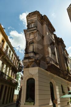 Havana, Cuba - 8 February 2015: Example of colonial architecture at Passeo Marti with balconies and wide windows, building at 5 esquinas