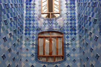Barcelona, Spain - 30 July 2020: Casa Batllo atrium with inner windows