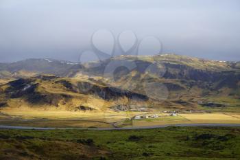 Area near Hveragerdi with mountains lit by the sun, South Iceland