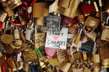 Love padlocks on a love padlocks on a bridge in Paris