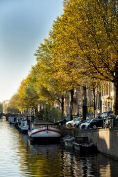 Boats along the canal in Amsterdam during Falls season