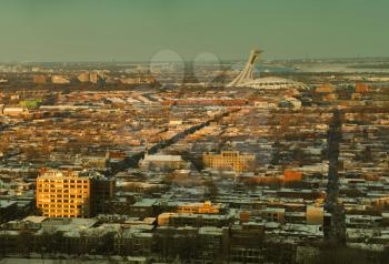 Panorama of Montreal during winter from the mont royal mountain.  Cross processed to look like and aged pictures.  Instagram style picture.