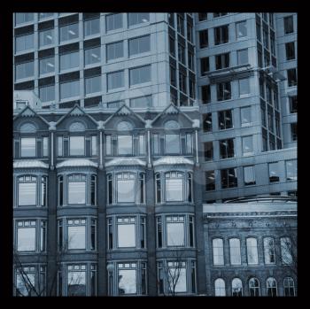 View of different facades of buildings in blue tone.  Instagram style picture.