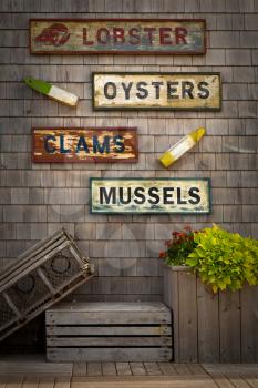 Seafood signs in vintage style on old tile background