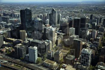Aerial view of buildings of Downtown Melbourne over the Yarra river in Australia 