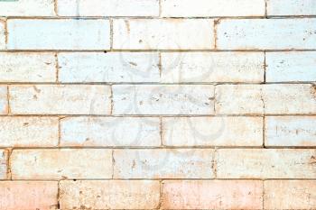 Dirty mat brick wall paint white and peach