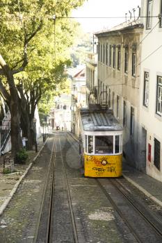 LISBON-PORTUGAL NOVEMBER11, 2015:  In operation since 1873, The Lisbon tramway network serves the municipality of Lisbon, Portugal.  Yellow tramway are popular with the tourists.