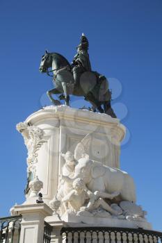 View of the equestrian statue of Joseph 1 of Portugal built during the 18th century at The Praa do Comrcio or Commerce Square and located in the city of Lisbon, Portugal.  Image taken from the street.