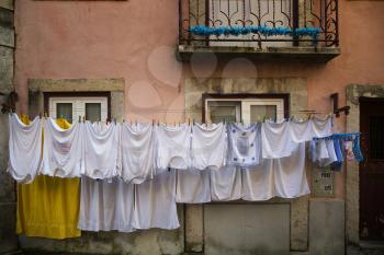White clothes on a clothesline in Alfama, Lisbon
