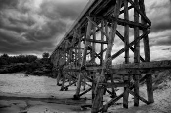 Trestle bridge in Kilcunda, Australia, 91 meter long built over the Bourne Creek.  Black and white.