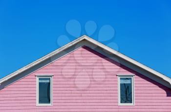 Detail of a pink rooftop in Iles de la Madeleine in Canada