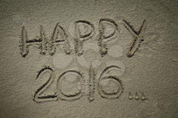 Happy 2016 write in a sand