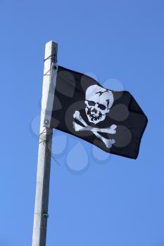 Black flag with a skull also named Jolly Roger 