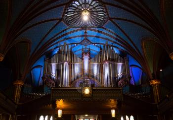 Blue vaults and organ at Notre Dame Basilica in old Montreal in Canada