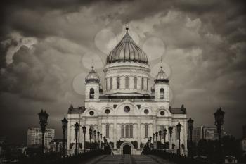 Dramatic sky over The Cathedral of Christ the Savior in Moscow, Russia in sepia to look vintage