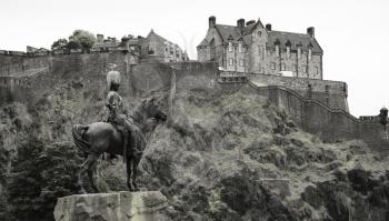 Equestrian monument to the Royal Scots Greys at the Princes Street Gardens with Edinburgh castle in background