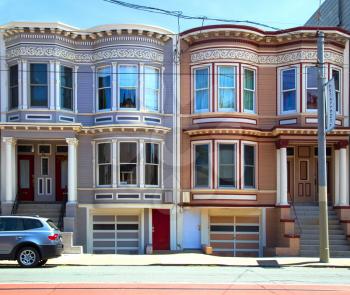 SAN FRANCISCO-USA, May 6, 2018:  Painted ladies are a designation for brightly painted Victorian and Edwardian buildings in San Francisco with downtown San Francisco in background.