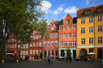 COPENHAGEN-DENMARK SEPT 2 2015:  Grbrdretorv is a public square in the centre of Copenhagen, Denmark.  The square is characterized by colorful house fronts and dominated by a large plane tree.