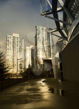 Sun on the windows of appartment towers in Downtown Vancouver after a rain
