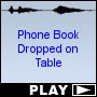 Phone Book Dropped on Table